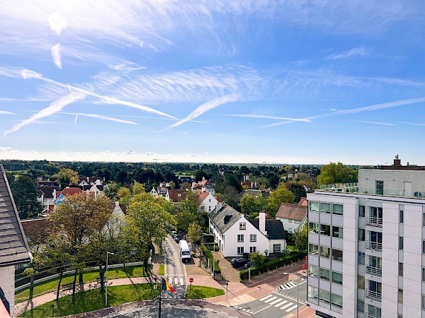 Nieuw duplex dakappartement met open zicht op het vernieuwde Burg. Fr. Desmidtplein.